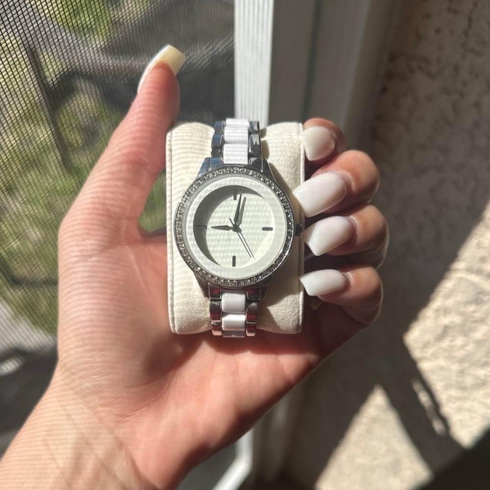 White and silver watch
